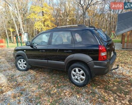 Черный Хендай Туксон, объемом двигателя 1.98 л и пробегом 192 тыс. км за 6900 $, фото 5 на Automoto.ua