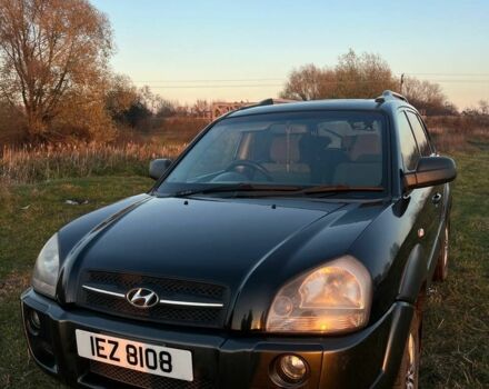 Черный Хендай Туксон, объемом двигателя 2 л и пробегом 137 тыс. км за 4300 $, фото 2 на Automoto.ua