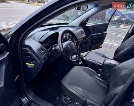 Хендай Туксон 2005 у Полтаві на Automoto.ua Чорний Хендай Туксон, об'ємом двигуна 1.98 л та пробігом 175 тис. км за 7700 $, фото 13 на Automoto.ua