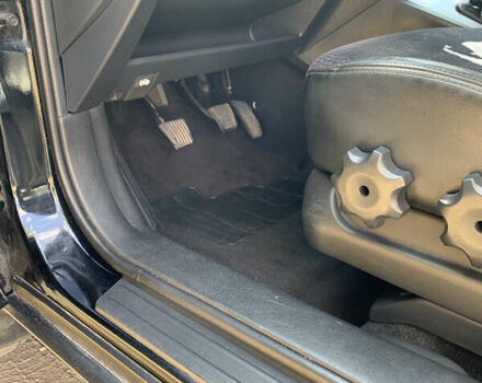 Черный Хендай Туксон, объемом двигателя 2 л и пробегом 219 тыс. км за 8400 $, фото 18 на Automoto.ua