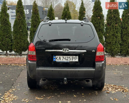 Черный Хендай Туксон, объемом двигателя 2.7 л и пробегом 220 тыс. км за 6950 $, фото 4 на Automoto.ua