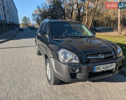 Черный Хендай Туксон, объемом двигателя 1.98 л и пробегом 226 тыс. км за 6500 $, фото 6 на Automoto.ua