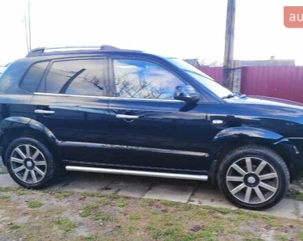 Черный Хендай Туксон, объемом двигателя 2 л и пробегом 208 тыс. км за 6950 $, фото 52 на Automoto.ua