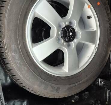 Черный Хендай Туксон, объемом двигателя 1.98 л и пробегом 230 тыс. км за 6390 $, фото 23 на Automoto.ua