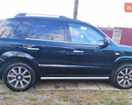 Черный Хендай Туксон, объемом двигателя 2 л и пробегом 208 тыс. км за 6950 $, фото 53 на Automoto.ua