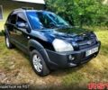 Черный Хендай Туксон, объемом двигателя 2 л и пробегом 289 тыс. км за 7400 $, фото 6 на Automoto.ua