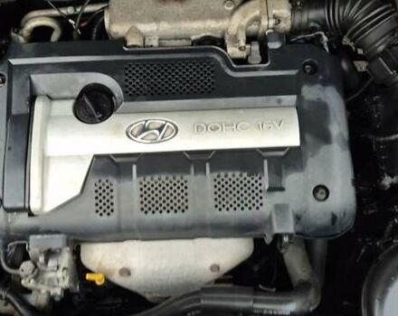 Черный Хендай Туксон, объемом двигателя 1.98 л и пробегом 230 тыс. км за 6390 $, фото 19 на Automoto.ua