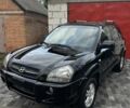 Черный Хендай Туксон, объемом двигателя 2 л и пробегом 164 тыс. км за 7800 $, фото 1 на Automoto.ua