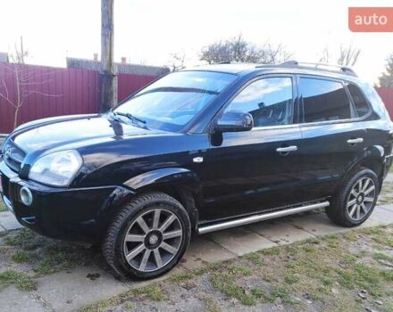 Черный Хендай Туксон, объемом двигателя 2 л и пробегом 208 тыс. км за 6950 $, фото 35 на Automoto.ua