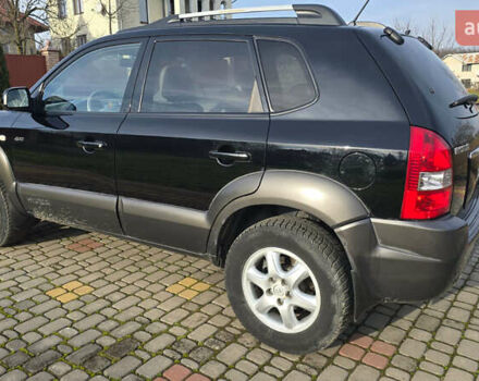 Черный Хендай Туксон, объемом двигателя 2 л и пробегом 217 тыс. км за 7552 $, фото 5 на Automoto.ua