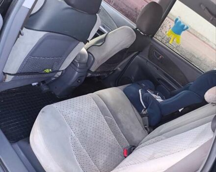 Черный Хендай Туксон, объемом двигателя 1.98 л и пробегом 285 тыс. км за 5600 $, фото 25 на Automoto.ua