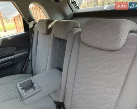 Черный Хендай Туксон, объемом двигателя 1.98 л и пробегом 192 тыс. км за 6900 $, фото 12 на Automoto.ua