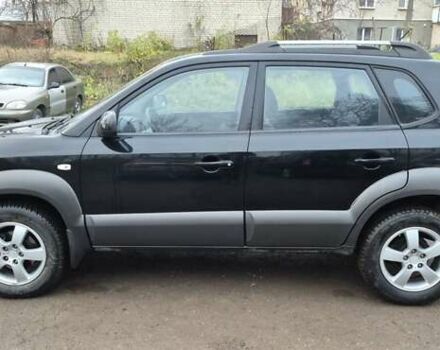 Черный Хендай Туксон, объемом двигателя 1.98 л и пробегом 230 тыс. км за 6390 $, фото 9 на Automoto.ua