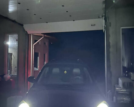 Черный Хендай Туксон, объемом двигателя 2 л и пробегом 217 тыс. км за 7552 $, фото 2 на Automoto.ua