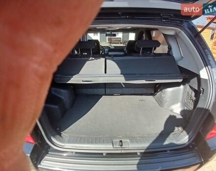 Черный Хендай Туксон, объемом двигателя 2 л и пробегом 315 тыс. км за 7000 $, фото 4 на Automoto.ua