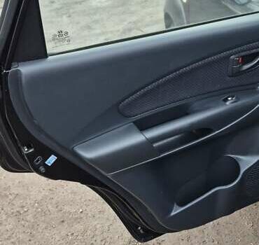 Черный Хендай Туксон, объемом двигателя 1.98 л и пробегом 230 тыс. км за 6390 $, фото 14 на Automoto.ua