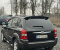 Черный Хендай Туксон, объемом двигателя 2 л и пробегом 257 тыс. км за 6800 $, фото 14 на Automoto.ua