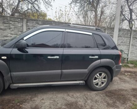 Черный Хендай Туксон, объемом двигателя 2 л и пробегом 224 тыс. км за 6800 $, фото 1 на Automoto.ua