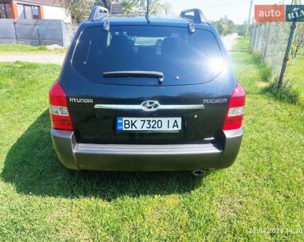 Чорний Хендай Туксон, об'ємом двигуна 2 л та пробігом 267 тис. км за 7300 $, фото 17 на Automoto.ua