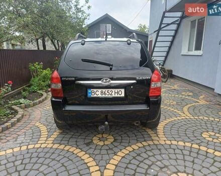 Чорний Хендай Туксон, об'ємом двигуна 1.98 л та пробігом 237 тис. км за 7500 $, фото 4 на Automoto.ua