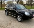 Черный Хендай Туксон, объемом двигателя 20 л и пробегом 269 тыс. км за 7000 $, фото 4 на Automoto.ua