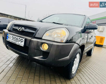 Черный Хендай Туксон, объемом двигателя 1.98 л и пробегом 252 тыс. км за 7300 $, фото 11 на Automoto.ua
