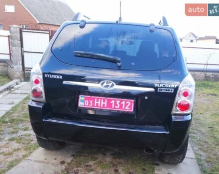 Черный Хендай Туксон, объемом двигателя 2 л и пробегом 208 тыс. км за 6950 $, фото 46 на Automoto.ua