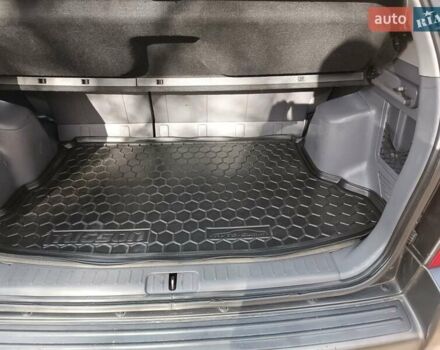 Черный Хендай Туксон, объемом двигателя 1.98 л и пробегом 192 тыс. км за 6900 $, фото 7 на Automoto.ua