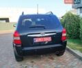 Черный Хендай Туксон, объемом двигателя 2 л и пробегом 260 тыс. км за 6750 $, фото 55 на Automoto.ua