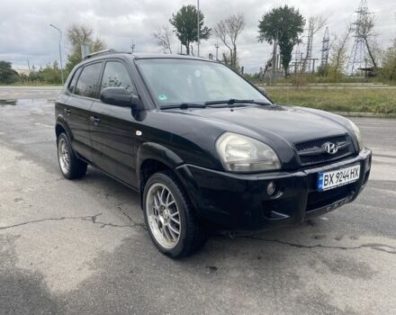 Черный Хендай Туксон, объемом двигателя 2 л и пробегом 230 тыс. км за 7500 $, фото 4 на Automoto.ua