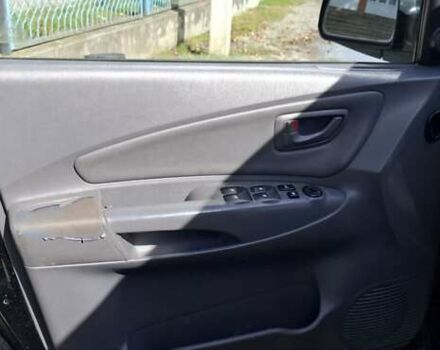 Черный Хендай Туксон, объемом двигателя 1.98 л и пробегом 193 тыс. км за 8000 $, фото 6 на Automoto.ua