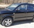 Черный Хендай Туксон, объемом двигателя 2 л и пробегом 210 тыс. км за 7000 $, фото 11 на Automoto.ua