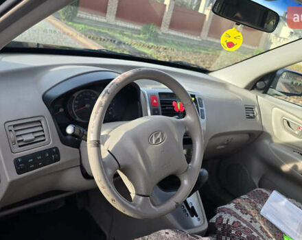 Черный Хендай Туксон, объемом двигателя 2 л и пробегом 217 тыс. км за 7552 $, фото 7 на Automoto.ua