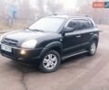 Черный Хендай Туксон, объемом двигателя 2 л и пробегом 225 тыс. км за 6600 $, фото 1 на Automoto.ua