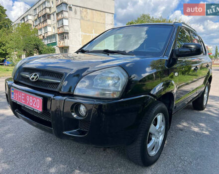 Черный Хендай Туксон, объемом двигателя 2 л и пробегом 207 тыс. км за 7300 $, фото 2 на Automoto.ua