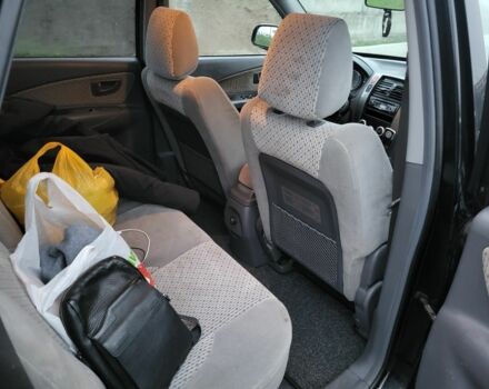 Черный Хендай Туксон, объемом двигателя 2 л и пробегом 180 тыс. км за 4500 $, фото 11 на Automoto.ua