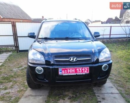 Черный Хендай Туксон, объемом двигателя 2 л и пробегом 208 тыс. км за 6950 $, фото 48 на Automoto.ua