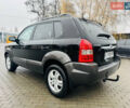 Черный Хендай Туксон, объемом двигателя 1.98 л и пробегом 252 тыс. км за 7300 $, фото 6 на Automoto.ua