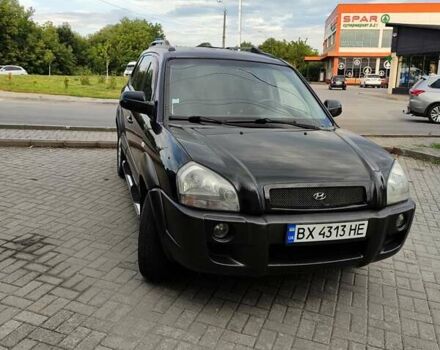 Черный Хендай Туксон, объемом двигателя 1.99 л и пробегом 250 тыс. км за 6650 $, фото 2 на Automoto.ua