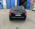 Черный Хендай Туксон, объемом двигателя 1.98 л и пробегом 215 тыс. км за 8600 $, фото 7 на Automoto.ua