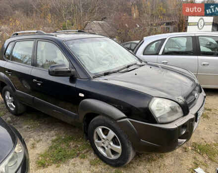 Черный Хендай Туксон, объемом двигателя 2 л и пробегом 211 тыс. км за 4444 $, фото 3 на Automoto.ua