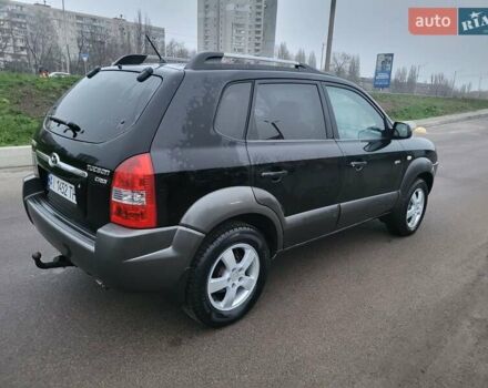 Чорний Хендай Туксон, об'ємом двигуна 2 л та пробігом 180 тис. км за 4500 $, фото 5 на Automoto.ua