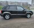 Черный Хендай Туксон, объемом двигателя 2 л и пробегом 180 тыс. км за 4500 $, фото 15 на Automoto.ua