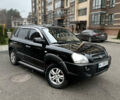 Чорний Хендай Туксон, об'ємом двигуна 1.98 л та пробігом 225 тис. км за 6600 $, фото 1 на Automoto.ua