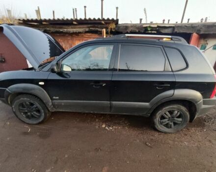 Черный Хендай Туксон, объемом двигателя 2 л и пробегом 370 тыс. км за 3300 $, фото 1 на Automoto.ua