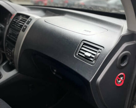 Чорний Хендай Туксон, об'ємом двигуна 1.98 л та пробігом 225 тис. км за 6600 $, фото 11 на Automoto.ua