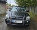Чорний Хендай Туксон, об'ємом двигуна 2 л та пробігом 378 тис. км за 3500 $, фото 1 на Automoto.ua
