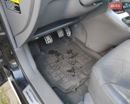 Черный Хендай Туксон, объемом двигателя 2 л и пробегом 208 тыс. км за 6950 $, фото 16 на Automoto.ua