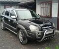 Чорний Хендай Туксон, об'ємом двигуна 2 л та пробігом 260 тис. км за 6800 $, фото 1 на Automoto.ua
