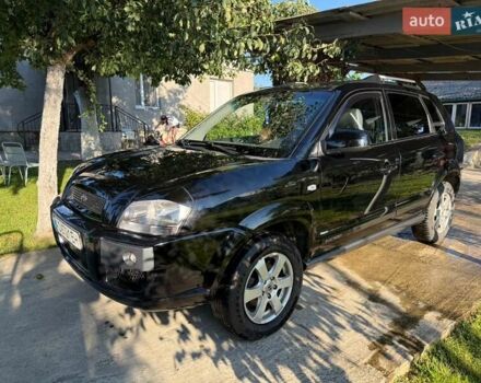 Чорний Хендай Туксон, об'ємом двигуна 1.98 л та пробігом 137 тис. км за 7600 $, фото 5 на Automoto.ua